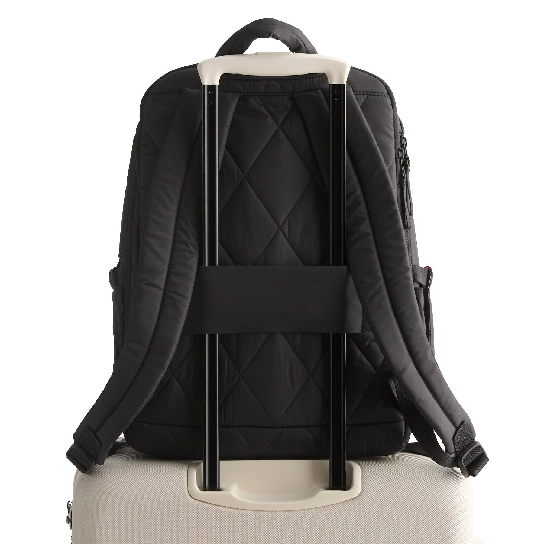 Black backpack with quilted design on a white background
