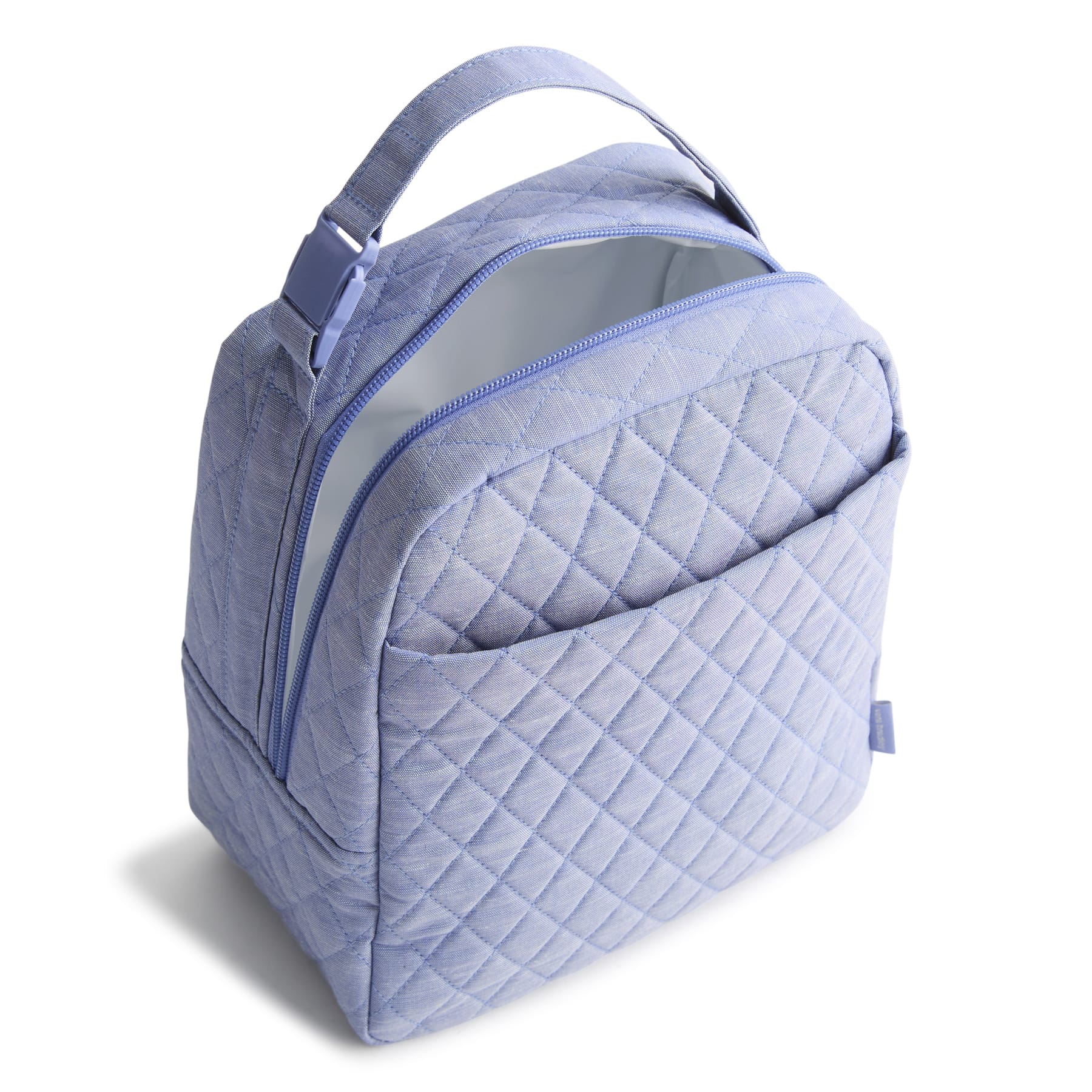 Quilted blue lunch bag on a white background