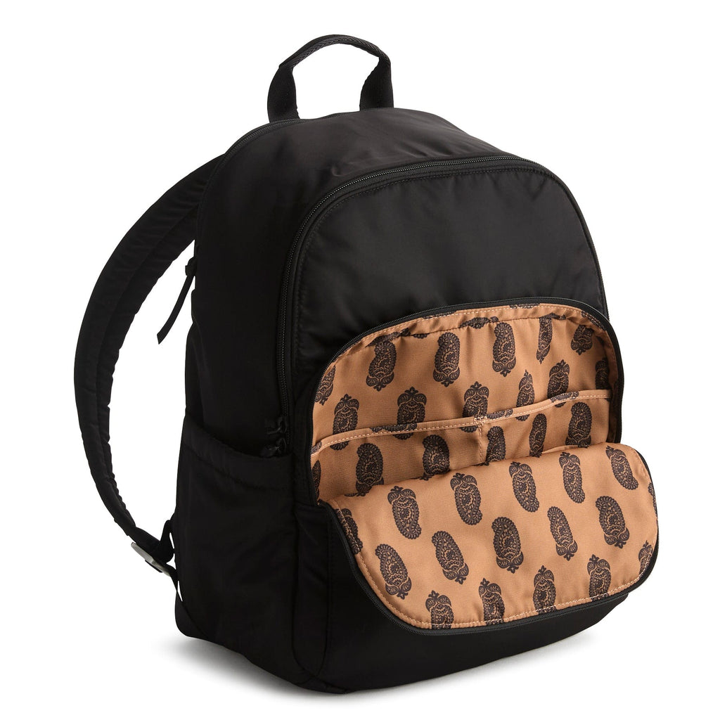 Black backpack with a tan interior pocket featuring a pattern on a white background
