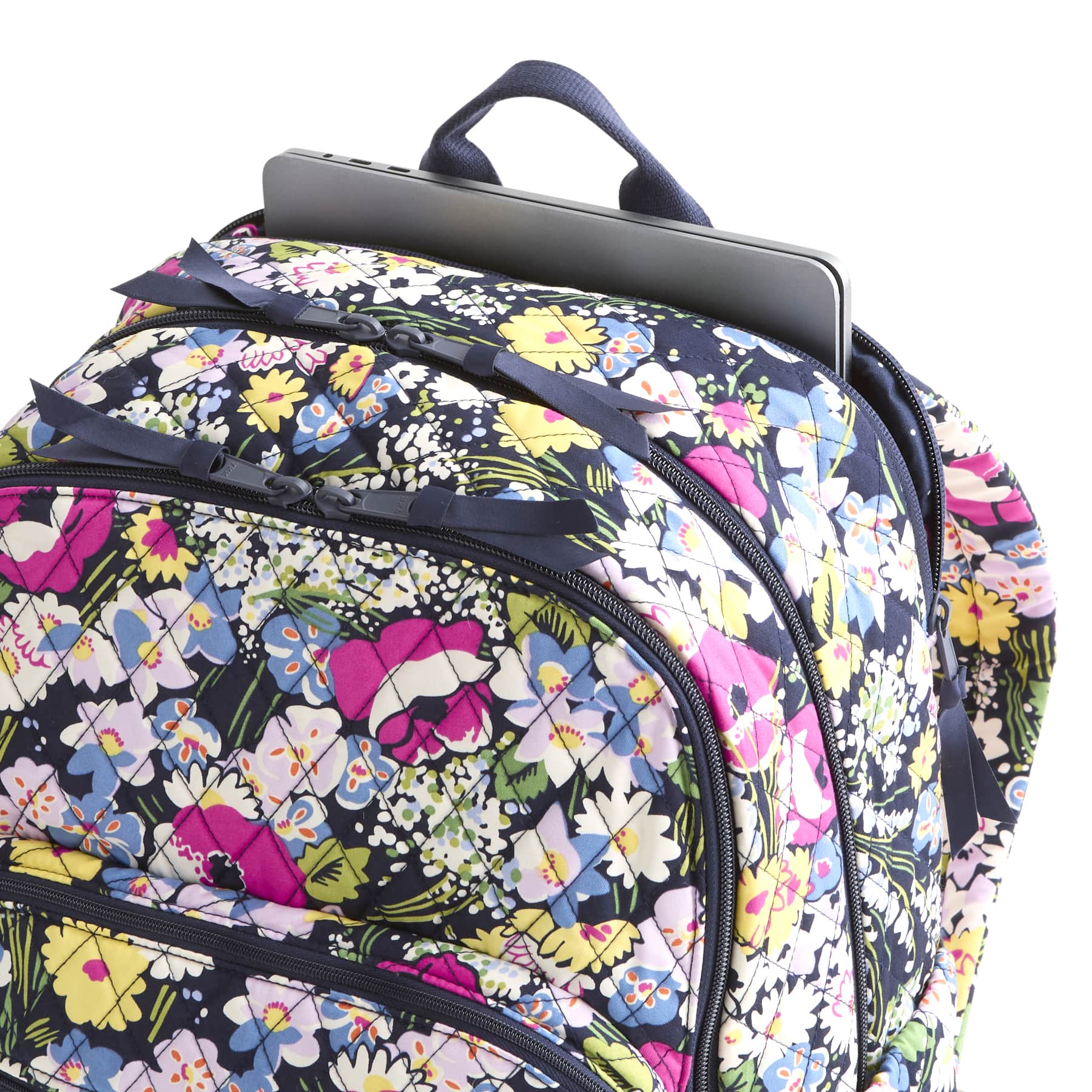 Floral patterned backpack with a laptop compartment on a white background