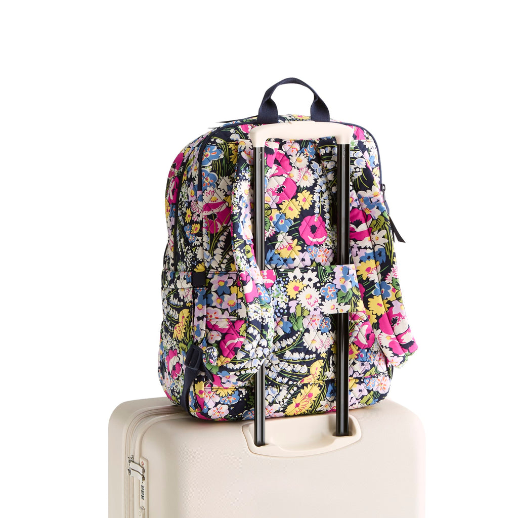 Floral-patterned backpack on a white background