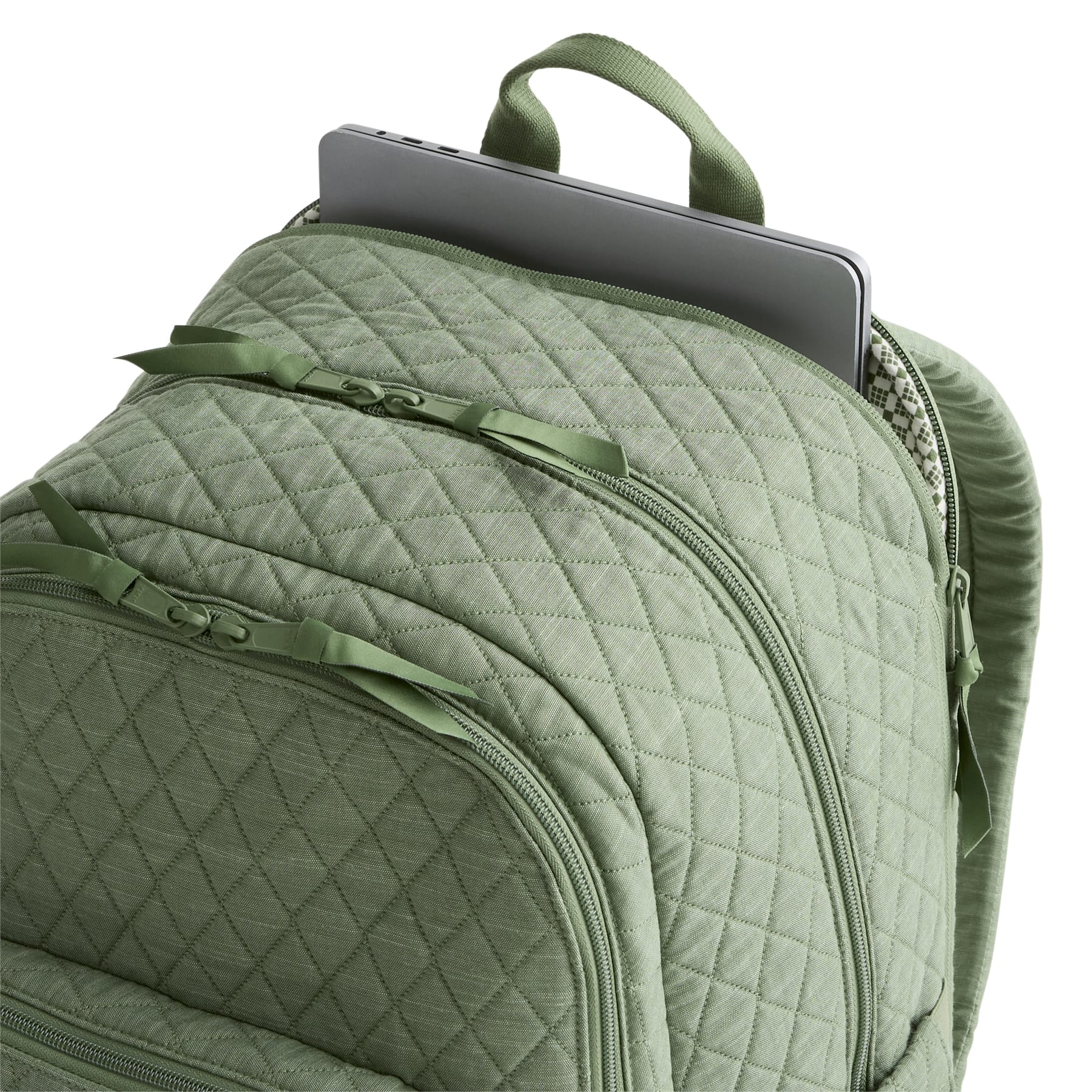 Green quilted backpack with a laptop compartment on a white background