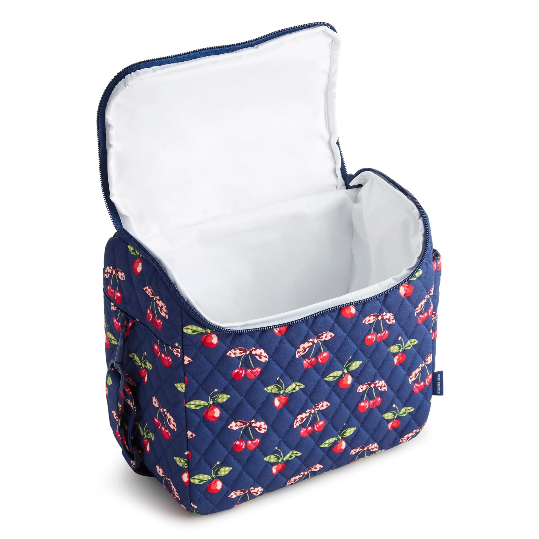 Navy blue cooler bag with cherry pattern on a white background