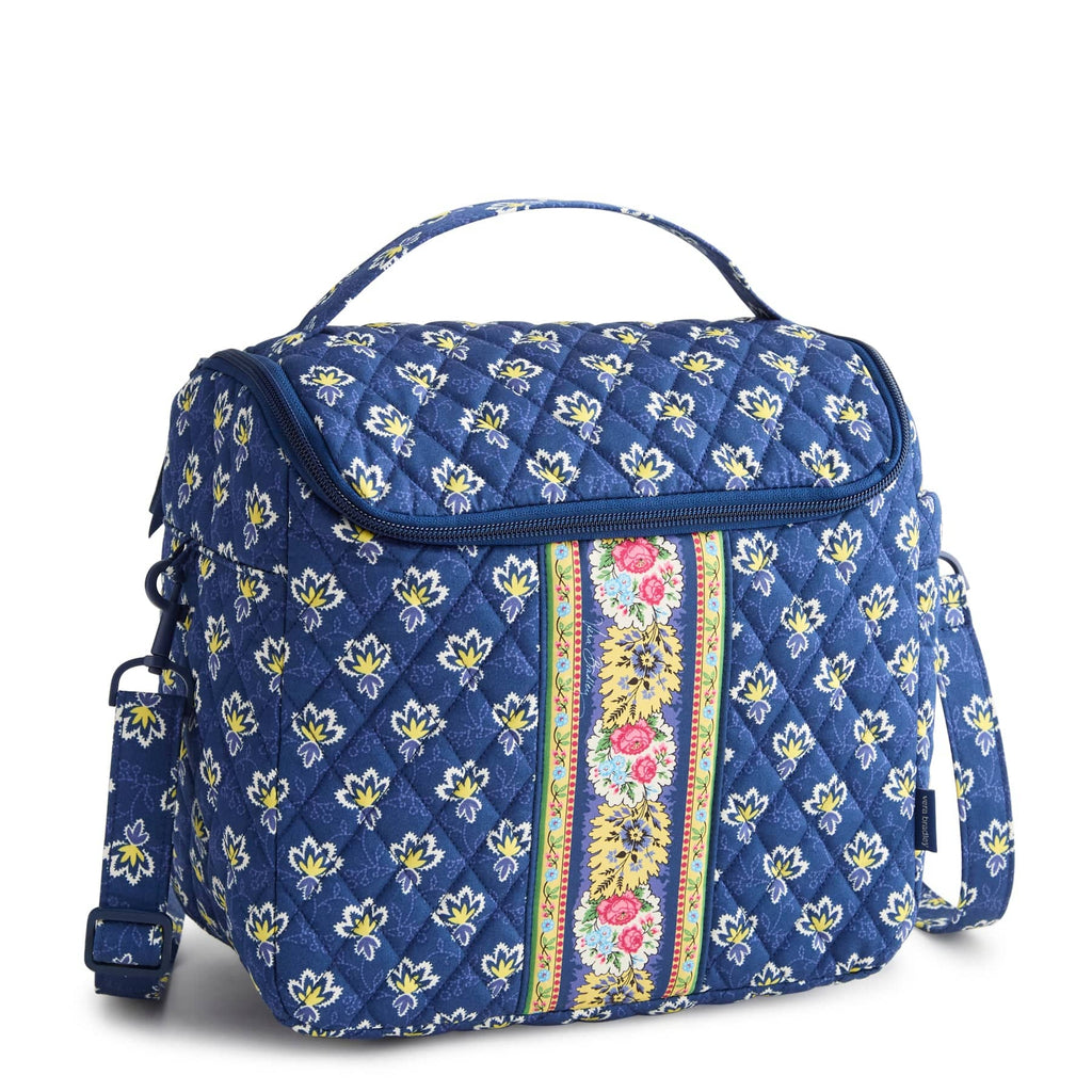 Blue floral-patterned bag with a colorful stripe on a white background