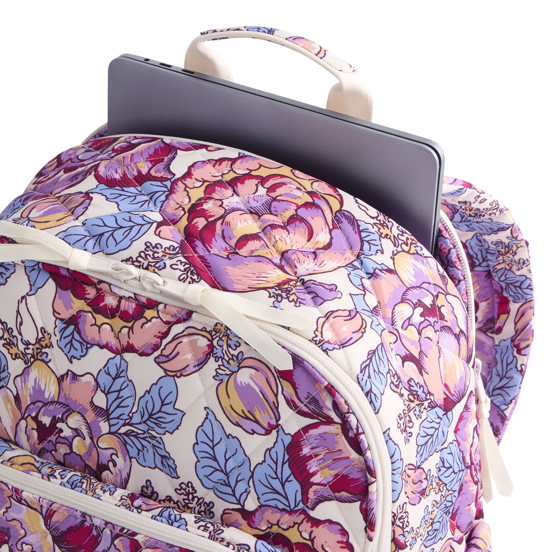 Floral-patterned backpack with a laptop compartment on a white background