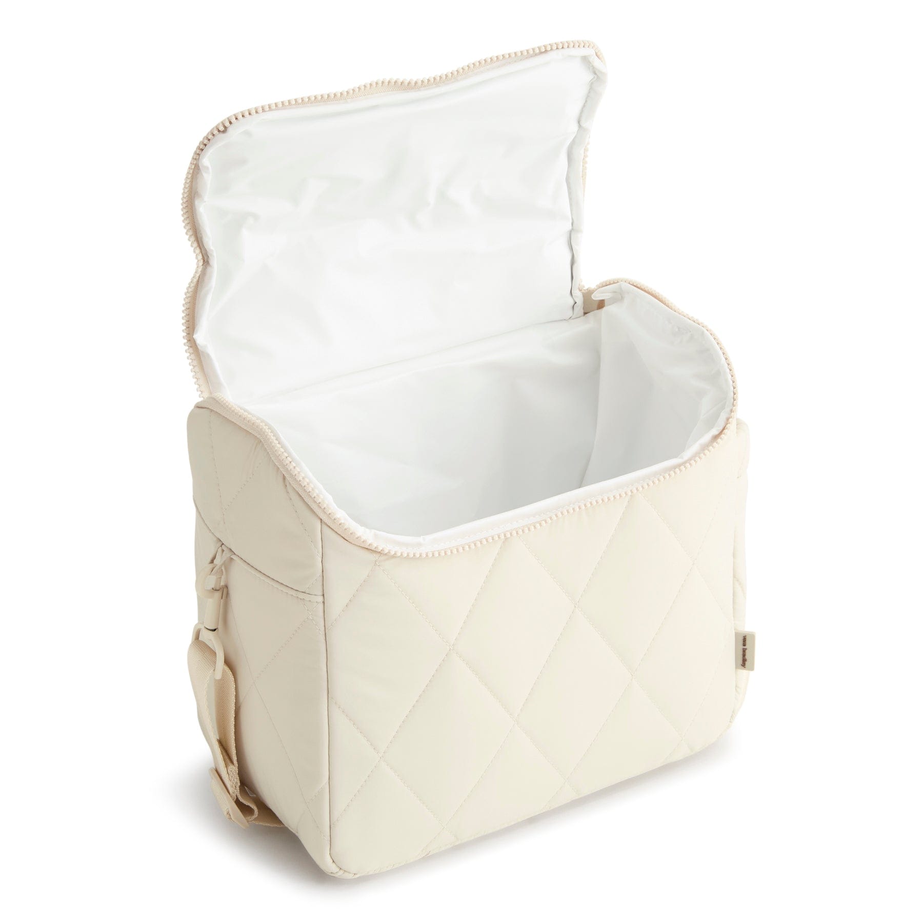 Beige quilted bag with open top on a white background