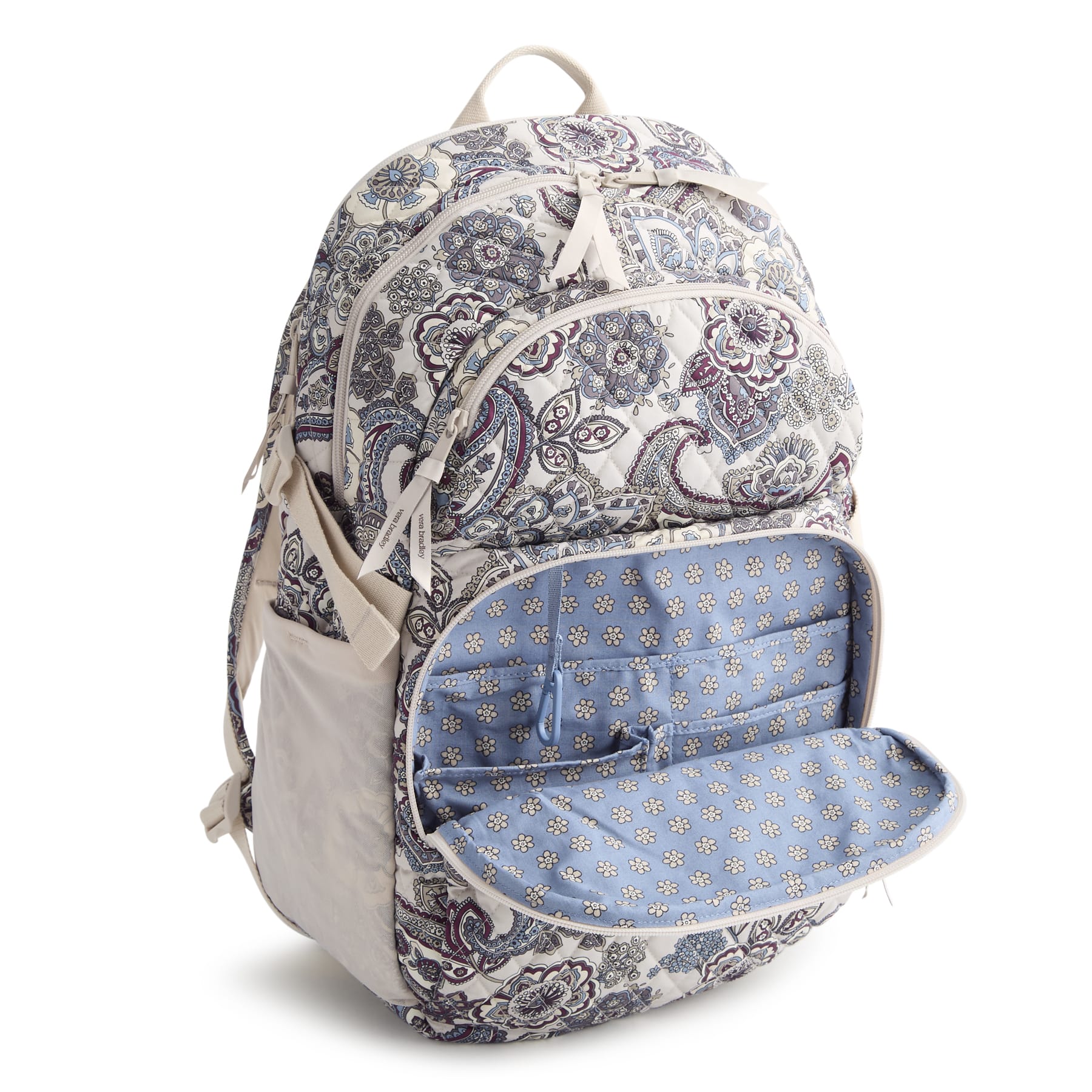 Patterned backpack with open front compartment on a white background